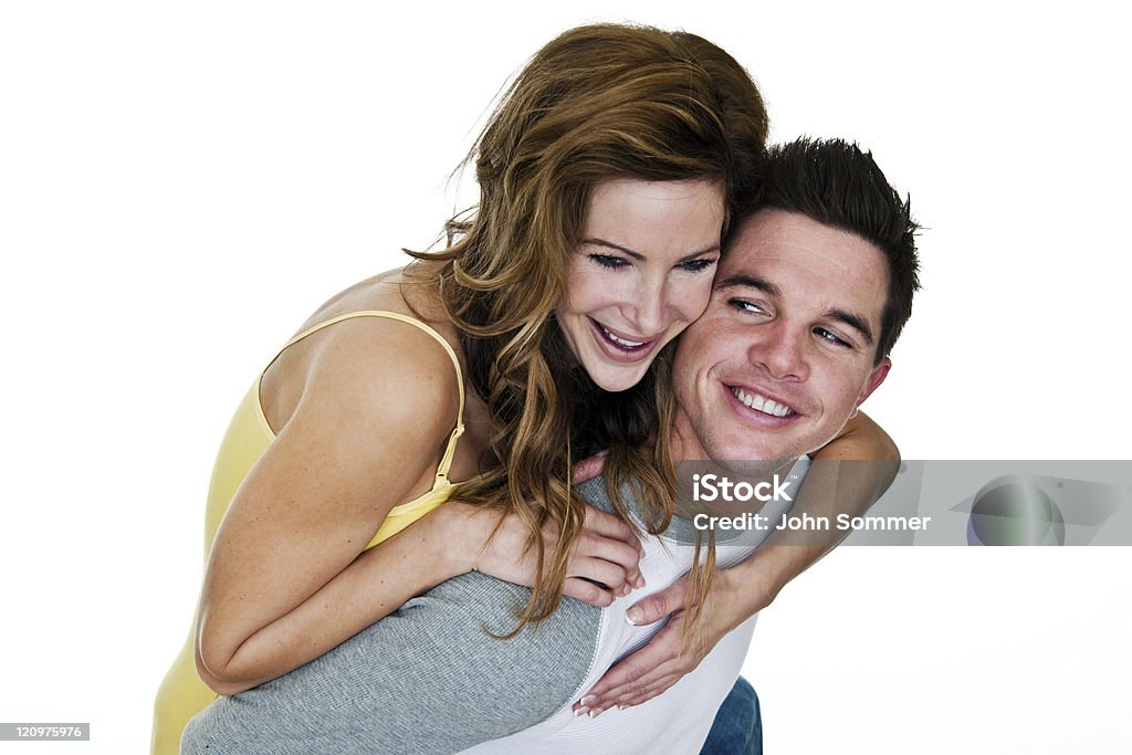 Happy couple Happy playful couple shot on white 20-29 Years Stock Photo