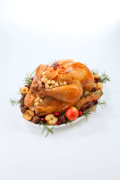 istock Roasted Turkey with Grab Apples over white 1209760831
