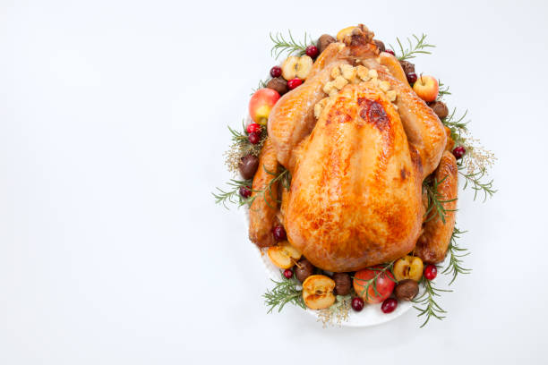 istock Roasted Turkey with Grab Apples over white 1209761334