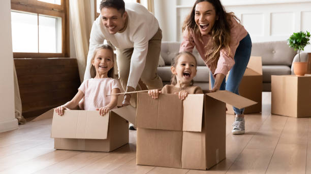istock Overjoyed family have fun on moving day 1209762881