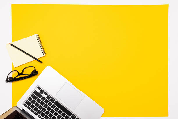 istock School and office supplies lie neatly on a yellow background 1209763579