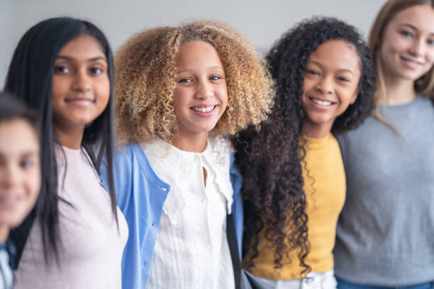 istock A portrait of junior high students standing in a line 1209763741