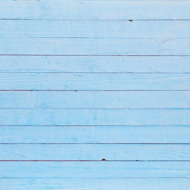 istock blue painted old wooden background 1209764213