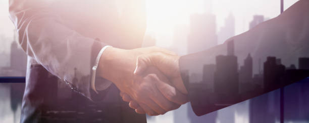 istock successful negotiate and handshake concept, two businessman shake hand with partner to celebration partnership and teamwork, business deal 1209765231