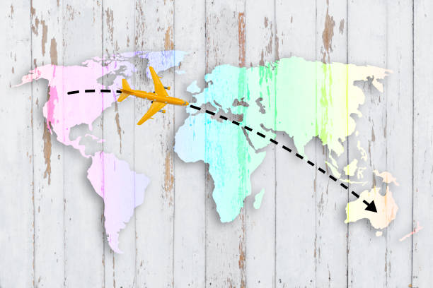 istock Plane model flying across the continent on graphic shape World map 1209769523