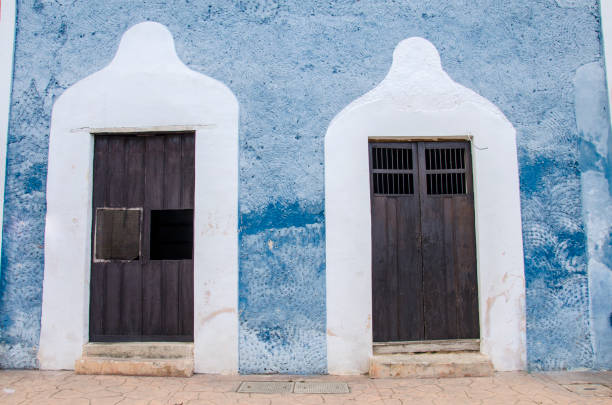 istock Rustic Door on a Blue Building in Mexico 1209772783