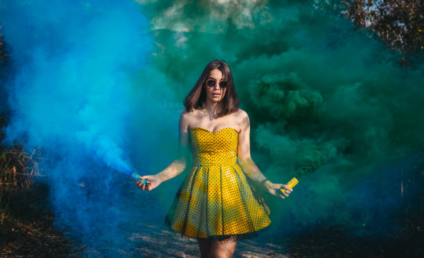 istock Charming Black-haired Girl Behind  Smoke 1209777293