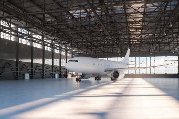 Airplane hangar with airplane Airplane hangar with airplane. This is entirely 3D generated image. airplane hangar stock pictures, royalty-free photos & images