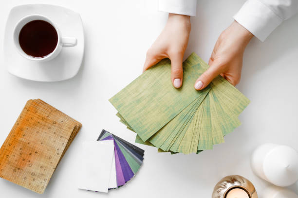 istock Woman hold metaphorical associative cards. 1209782955