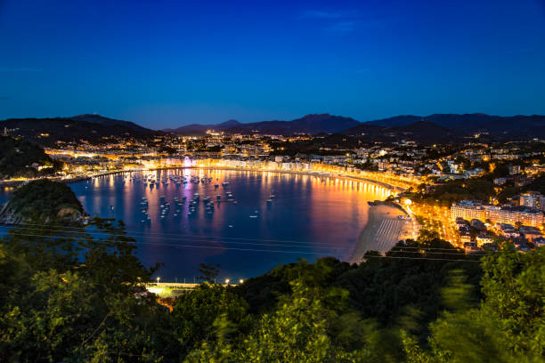 istock Donostia San Sebastian at night Spain Europe 1209803003