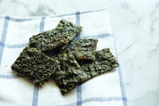 Crispy Seaweed Close up of Crispy Seaweed nori stock pictures, royalty-free photos & images