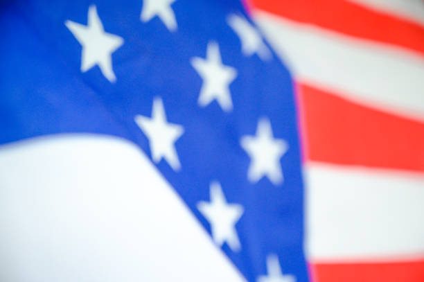 istock Blur America flag waving with the wind for memorial day. 1209804162