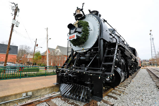 Collierville TN USA - December 22, 2019 : Taken this picture of a closed railway station in Collierville TN USA of a steam engine on display. This is a tourist destination for the locals and good picnic place for families.