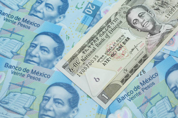 istock An Ethiopian one birr bank note with Mexican twenty peso bank notes 1209806163