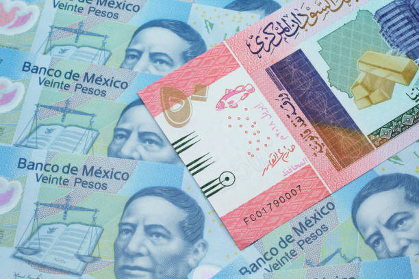 istock A fifty Sudanese pound note with Mexican twenty peso bank notes 1209806190
