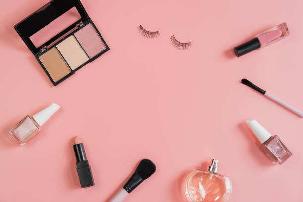 istock Woman cosmetics and make up on pink background, Top view 1209808671
