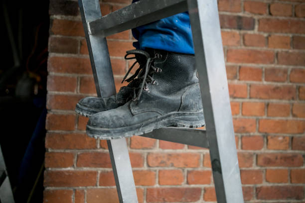 istock Workers are installing plasterboard drywall for gypsum walls in apartment is under construction, remodeling, renovation, extension, restoration and reconstruction. 1209810391