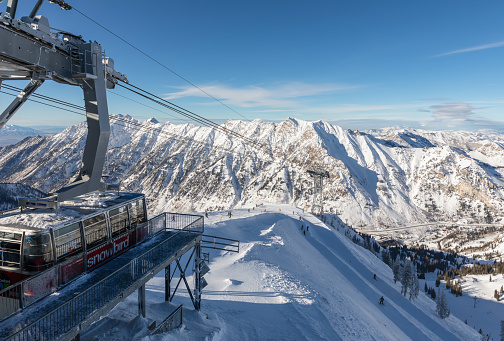 Snowbird, UT / USA - January 7, 2020: Aerial Tram viewed from the top of Hidden Peak at Snowbird Ski Resort in Little Cottonwood Canyon in the Wasatch Range near Salt Lake City, Utah, USA.