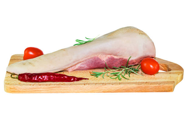 Raw beef tongue isolated on a white background,  meat offal, selective focus