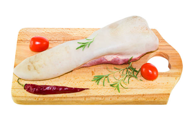 Raw beef tongue isolated on a white background,  meat offal, selective focus