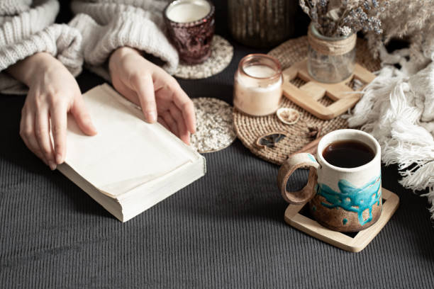 istock Still life with a beautiful Cup and female hands. 1209818841