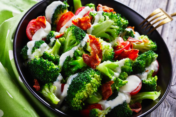 istock broccoli tomato salad with crispy fried bacon and cheese yogurt dressing 1209818867