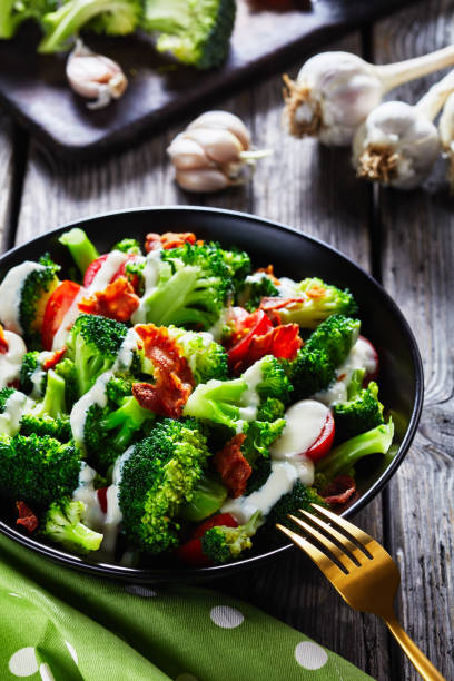istock broccoli tomato salad with crispy fried bacon and cheese yogurt dressing 1209818892