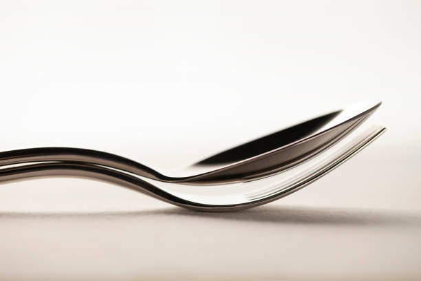 An old-fashioned baby spoon, isolated on a white background. Clipping path included.