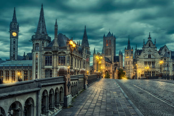 Ghent Cityscape from St Michael's Bridge, Belgium Ghent is a port city in northwest Belgium, at the confluence of the Leie and Scheldt rivers. belgium photos stock pictures, royalty-free photos & images