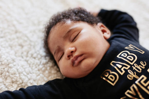High angle shot of an adorable little baby girl sleeping peacefully at home