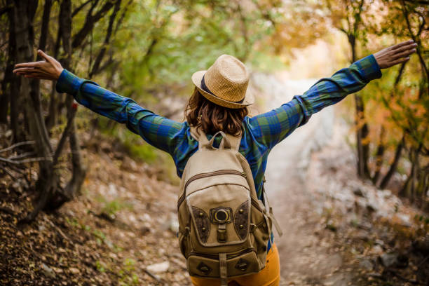 istock Woman walking in nature 1209825217