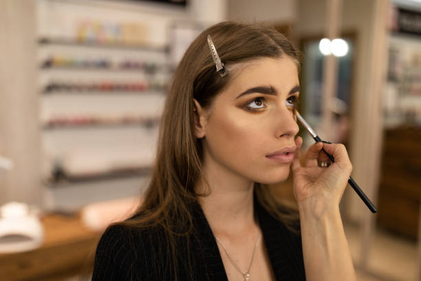 istock Young woman in professional beauty studio 1209827160