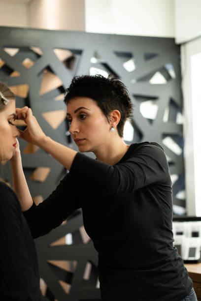 istock Young woman in professional beauty studio 1209829559