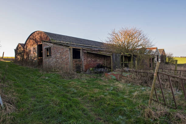 Old derelict farm building barn in remote rural setting