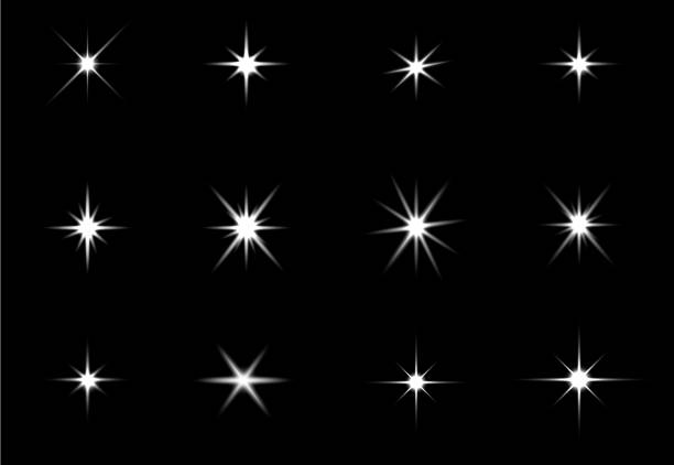 glühende lichter wirkung, fackel, explosion und sterne. spezialeffekt isoliert auf schwarzem hintergrund - star stock-grafiken, -clipart, -cartoons und -symbole