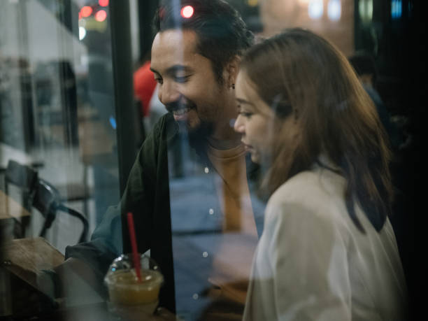 istock Happy couple on a date at coffee place. 1209836127