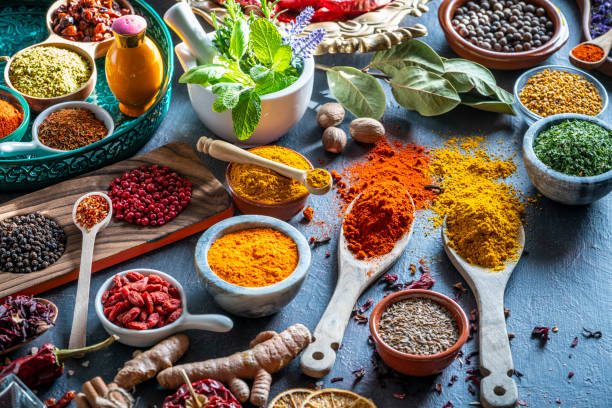 istock Spices herbs condiments seasoning on grunge gray background 1209837547