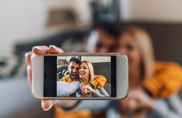 istock Young couple at home 1209837576