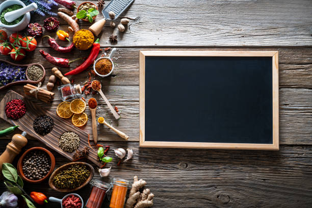 istock Spices herbs condiments seasoning on rustic wooden table 1209837764