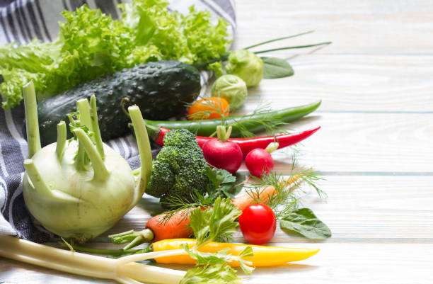 istock Fresh raw vegetables and spices with empty space  food diet background concept 1209838087