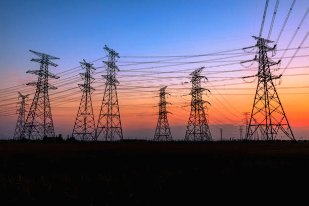 istock High voltage power tower and nature landscape at sunset 1209840395