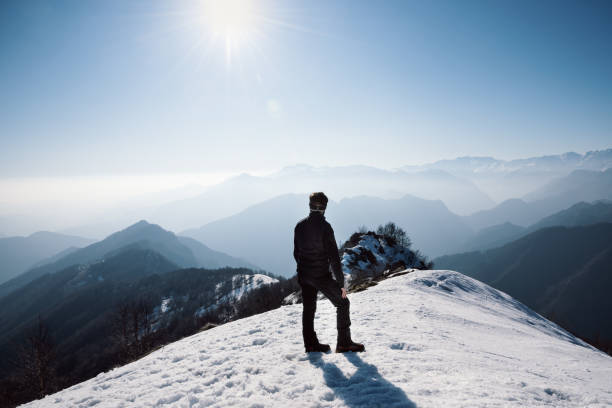istock A man looking at the mountain panorama 1209840396