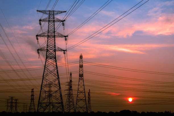 istock High voltage power tower and nature landscape at sunset 1209840414