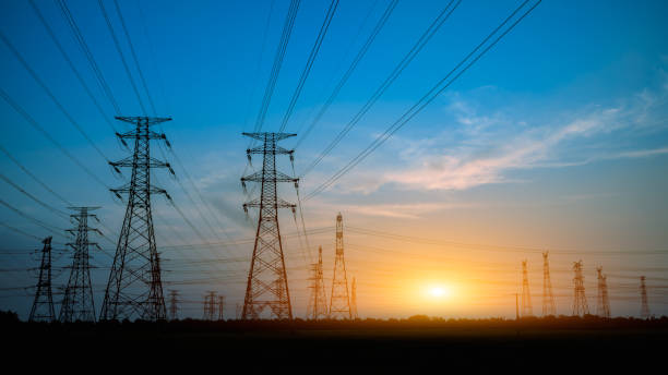 istock High voltage power tower and nature landscape at sunset 1209841170