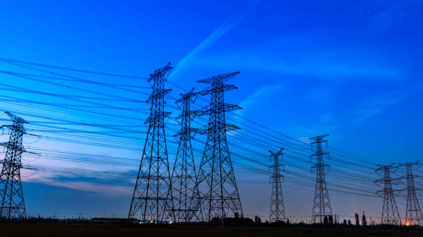 istock High voltage power tower and nature landscape at sunset 1209841313