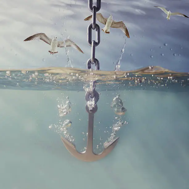 Photo of anchor dropping into water