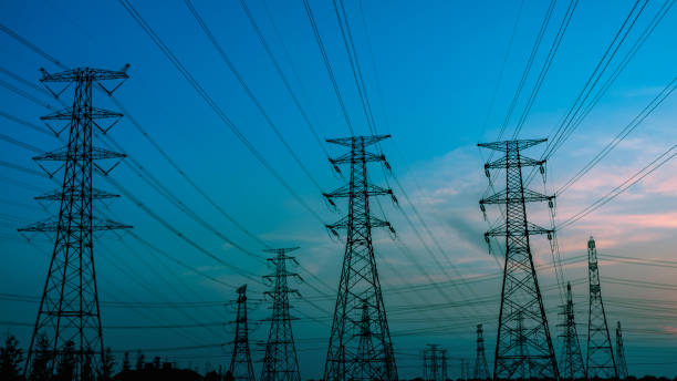 istock High voltage power tower and nature landscape at sunset 1209843016