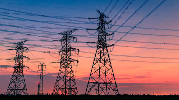 istock High voltage power tower and nature landscape at sunset 1209843333
