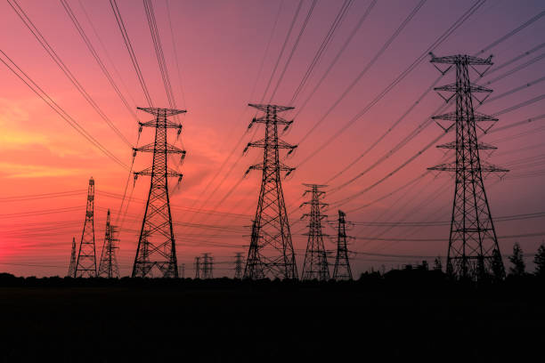 istock High voltage power tower and nature landscape at sunset 1209843334