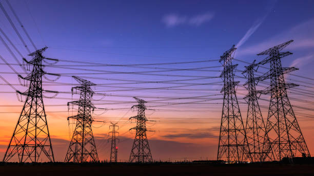 istock High voltage power tower and nature landscape at sunset 1209845505